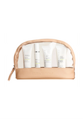 Ultraceuticals Travel Essentials Set featuring four travel-sized skincare products in a cosmetic bag.